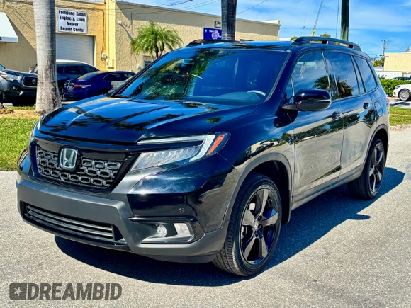 2021 Honda Passport Elite with VIN 5FNYF8H01MB013559, listed as a Copart auction lot 53684375 with 37,300 mi miles and Clean Title. Bid and sale history available at carsss.com. Image 2.