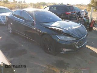 2014 Tesla Model S 60 z VIN 5YJSA1H18EFP40168, wystawiony jako IAAI lot #40777818 z przebiegiem 145 492 mil mil oraz . Historia ofert i sprzedaży dostępna na DreamBid. Obrazek 1.