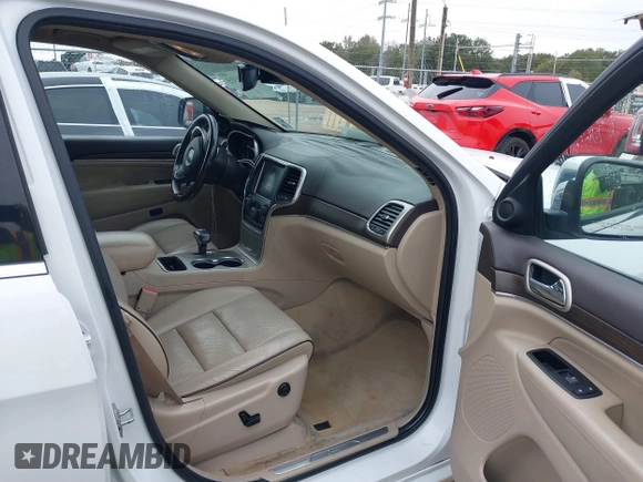 2014 Jeep Grand Cherokee Overland with VIN 1C4RJECG4EC543092, listed as a IAAI auction lot 40981315 with 149,096 mi miles. Bid and sale history available at carsss.com. Image 5.