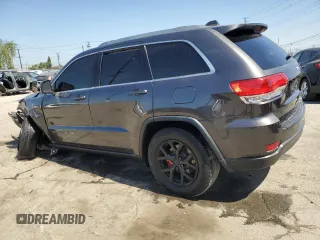 2018 Jeep Grand Cherokee Laredo E with VIN 1C4RJEAG9JC397382, listed as a Copart auction lot 56550815 with 72,239 mi miles and Salvage title. Bid and sale history available at DreamBid. Image 2.