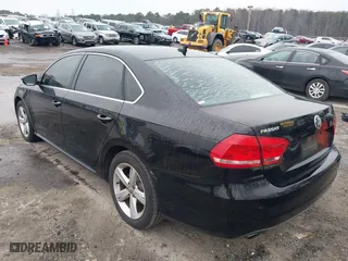 2012 Volkswagen Passat SE with VIN 1VWBP7A3XCC049552, listed as a IAAI auction lot 41627827 with 196,428 mi miles. Bid and sale history available at carsss.com. Image 3.