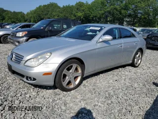 2006 Mercedes-Benz CLS 500 with VIN WDDDJ75X66A049287, listed as a Copart auction lot 63590535 with 113,594 mi miles and Salvage title. Bid and sale history available at DreamBid. Image 1.