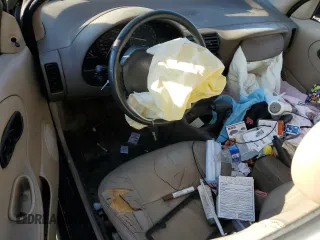 1999 Saturn SL z VIN 1G8ZK5272XZ163225, wystawiony jako Copart lot #41788725 z przebiegiem 144 999 mil mil oraz Szkoda całkowita • Salvage title. Historia ofert i sprzedaży dostępna na DreamBid. Obrazek 8.