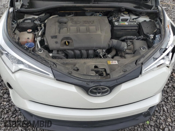 2018 Toyota C-HR XLE z VIN JTNKHMBXXJ1003871, wystawiony jako Copart lot #49984355 z przebiegiem 101 395 mil mil oraz Szkoda całkowita • Salvage title. Historia ofert i sprzedaży dostępna na DreamBid. Obrazek 11.