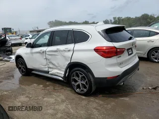 2019 BMW X1 sDrive28i with VIN WBXHU7C57K5L10243, listed as a Copart auction lot 48959423 with 42,248 mi miles. Bid and sale history available at carsss.com. Image 2.