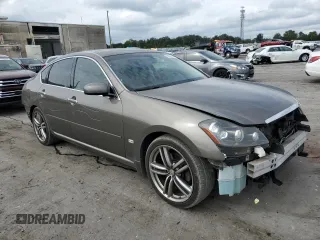 2006 Infiniti M45 with VIN JNKBY01E66M208055, listed as a Copart auction lot 70673254 with 144,719 mi miles and Salvage Title. Bid and sale history available at carsss.com. Image 4.