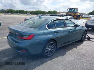 2020 BMW 3 Series 330i xDrive with VIN 3MW5R7J03L8B09157, listed as a IAAI auction lot 39168393 with 69,052 mi miles. Bid and sale history available at carsss.com. Image 4.