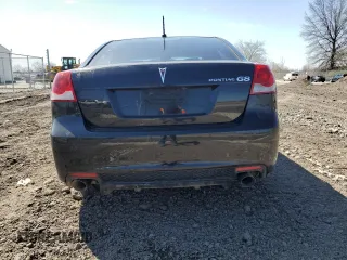 2009 Pontiac G8 z VIN 6G2ER57769L191129, wystawiony jako Copart lot #52135025 z przebiegiem 74 581 mil mil oraz Nie do naprawy • Non repairable. Historia ofert i sprzedaży dostępna na DreamBid. Obrazek 6.