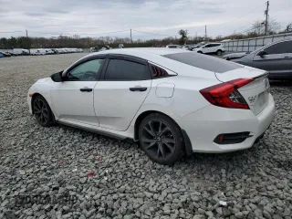 2019 Honda Civic Sport with VIN 2HGFC2F87KH513286, listed as a Copart auction lot 52753625 with 52,896 mi miles and Salvage Title. Bid and sale history available at DreamBid. Image 2.
