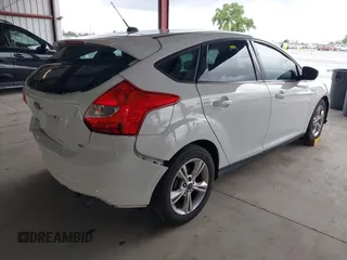2014 Ford Focus SE with VIN 1FADP3K21EL301336, listed as a IAAI auction lot 41939452 with 118,203 mi miles. Bid and sale history available at carsss.com. Image 4.
