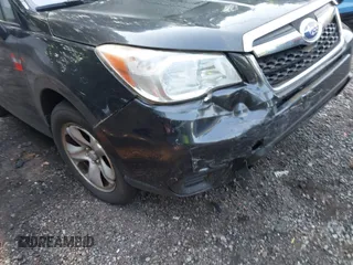 2014 Subaru Forester 2.5i with VIN JF2SJAAC5EH512996, listed as a IAAI auction lot 42480386 with 102,944 mi miles and . Bid and sale history available at DreamBid. Image 16.