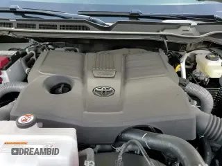2025 Toyota Tundra SR с VIN 5TFLA5DB5SX297621, выставлен на аукционе Copart как лот 64099365 с пробегом 4 281 миль миль и Списание • Salvage title. История ставок и продаж доступна на DreamBid. Изображение 13.