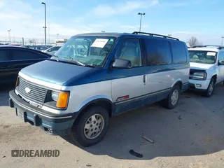 1994 Chevrolet Astro with VIN 1GNEL19W5RB123229, listed as a IAAI auction lot 41675096 with 186,497 mi miles. Bid and sale history available at carsss.com. Image 2.