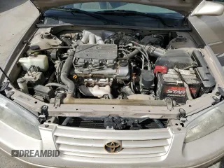 1998 Toyota Camry LE z VIN JT2BF28K4W0114447, wystawiony jako Copart lot #50846275 z przebiegiem 288 989 mil mil oraz Szkoda całkowita • Salvage title. Historia ofert i sprzedaży dostępna na DreamBid. Obrazek 11.