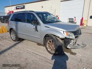 2013 Suzuki Grand Vitara Limited with VIN JS3TE0D74D4100091, listed as a IAAI auction lot 41684748 with 176,696 mi miles. Bid and sale history available at carsss.com. Image 1.
