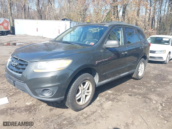 2010 Hyundai Santa Fe GLS with VIN 5NMSG3AB2AH390591, listed as a IAAI auction lot 42042117 with 240,875 mi miles. Bid and sale history available at carsss.com. Image 2.
