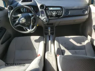 2011 Honda Insight LX z VIN JHMZE2H57BS004024, wystawiony jako Copart lot #54051775 z przebiegiem 161 198 mil mil oraz Szkoda całkowita • Salvage title. Historia ofert i sprzedaży dostępna na DreamBid. Obrazek 8.