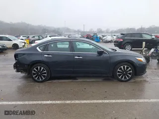 2018 Nissan Altima 2.5 SR with VIN 1N4AL3AP3JC165989, listed as a IAAI auction lot 41490589 with 84,879 mi miles. Bid and sale history available at carsss.com. Image 13.