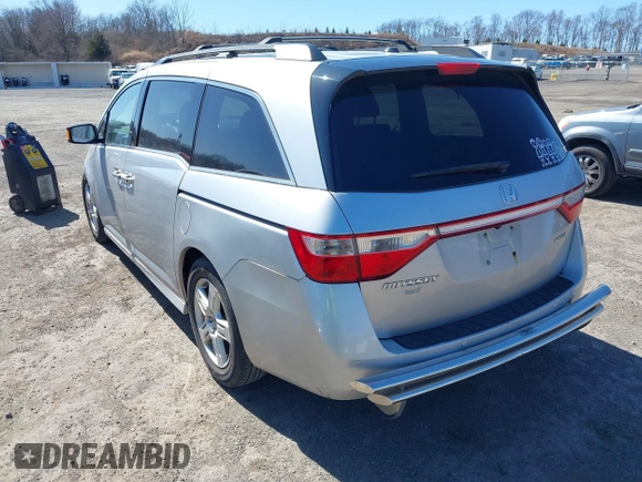 2012 Honda Odyssey Touring with VIN 5FNRL5H93CB042392, listed as a IAAI auction lot 41859533 with 169,141 mi miles. Bid and sale history available at carsss.com. Image 3.