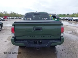 2021 Toyota Tacoma SR with VIN 3TMCZ5AN5MM380286, listed as a IAAI auction lot 42165523 with 58,965 mi miles and . Bid and sale history available at DreamBid. Image 16.