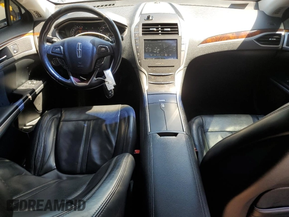 2015 Lincoln MKZ z VIN 3LN6L2JK8FR616661, wystawiony jako Copart lot #61588325 z przebiegiem 65 382 mil mil oraz Szkoda całkowita • Salvage title. Historia ofert i sprzedaży dostępna na DreamBid. Obrazek 8.