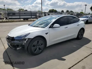 2023 Tesla Model 3 z VIN 5YJ3E1EA5PF641310, wystawiony jako Copart lot #54759305 z przebiegiem 53 670 mil mil oraz Szkoda całkowita • Salvage title. Historia ofert i sprzedaży dostępna na DreamBid. Obrazek 1.