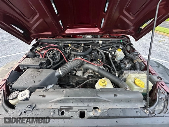 2007 Jeep Wrangler Unlimited X with VIN 1J8GA39147L156911, listed as a Copart auction lot 65987405 with 115,766 mi miles and Clean title. Bid and sale history available at DreamBid. Image 7.