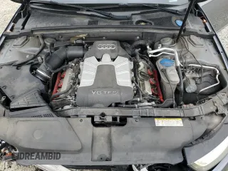 2016 Audi S4 Premium Plus z VIN WAUDGAFLXGA002067, wystawiony jako Copart lot #44027515 z przebiegiem 63 951 mil mil oraz Szkody całkowita. Historia ofert i sprzedaży dostępna na DreamBid. Obrazek 13.