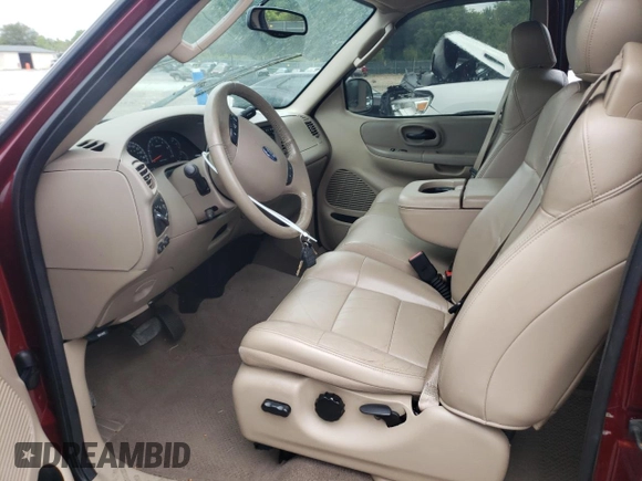 2003 Ford F-150 XL with VIN 1FTRX07L73KC07352, listed as a Copart auction lot 64639214 with 108,003 mi miles and Salvage title. Bid and sale history available at DreamBid. Image 7.