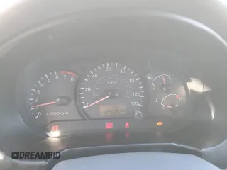 2003 Hyundai Accent GL z VIN KMHCG45C63U413388, wystawiony jako Copart lot #88979235 z przebiegiem 240 928 mil mil oraz Szkoda całkowita • Salvage title. Historia ofert i sprzedaży dostępna na DreamBid. Obrazek 9.