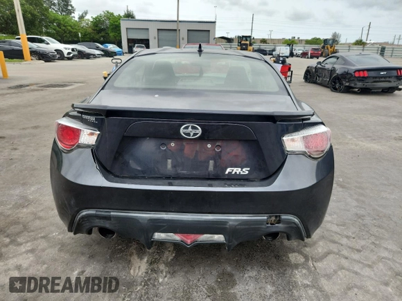 2015 Scion FR-S z VIN JF1ZNAA12F8711821, wystawiony jako Copart lot #59886505 z przebiegiem 115 796 mil mil oraz Szkoda całkowita • Salvage title. Historia ofert i sprzedaży dostępna na DreamBid. Obrazek 6.