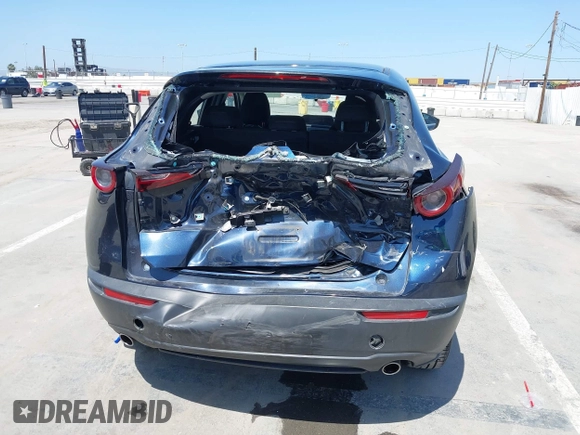 2021 Mazda CX-30 S with VIN 3MVDMAAL1MM270540, listed as a IAAI auction lot 42521513 with 63,993 mi miles and . Bid and sale history available at DreamBid. Image 6.