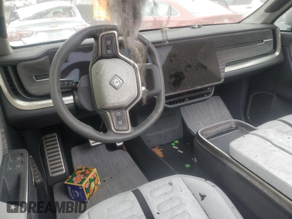 2022 Rivian R1T Adventure z VIN 7FCTGAAA5NN014020, wystawiony jako Copart lot #81367764 z przebiegiem Nie podano mil oraz Szkody całkowita. Historia ofert i sprzedaży dostępna na DreamBid. Obrazek 8.