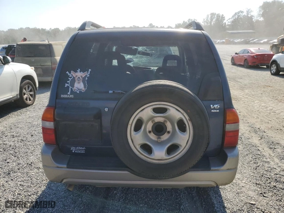 2002 Suzuki Grand Vitara JLX with VIN JS3TD62V424152230, listed as a Copart auction lot 74657294 with 160,135 mi miles and Salvage Title. Bid and sale history available at carsss.com. Image 6.