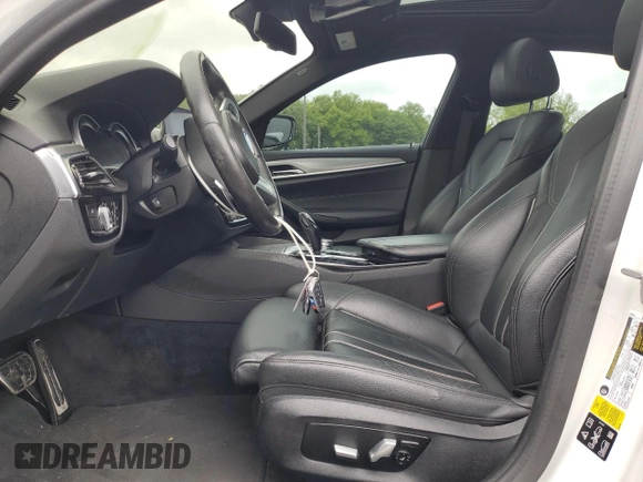 2019 BMW 5 Series 540i xDrive with VIN WBAJE7C58KWW37088, listed as a Copart auction lot 57759905 with 64,621 mi miles and Salvage title. Bid and sale history available at DreamBid. Image 7.