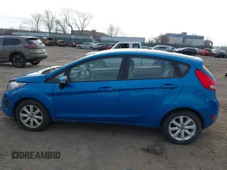2013 Ford Fiesta SE with VIN 3FADP4EJ6DM130511, listed as a IAAI auction lot 41757636 with 153,664 mi miles. Bid and sale history available at carsss.com. Image 14.