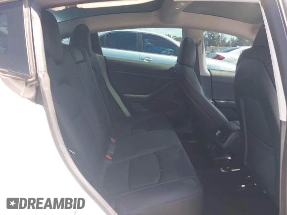 2022 Tesla Model 3 Long Range with VIN 5YJ3E1EB1NF289719, listed as a IAAI auction lot 41968273 with 73,368 mi miles and . Bid and sale history available at DreamBid. Image 8.