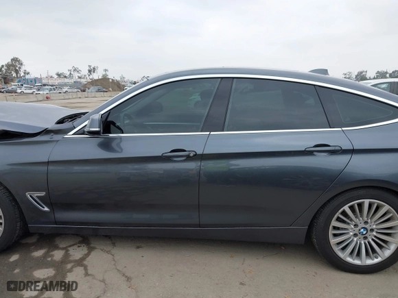2015 BMW 3 Series Gran Turismo 328i xDrive with VIN WBA3X5C50FD559804, listed as a IAAI auction lot 41902204 with 88,891 mi miles. Bid and sale history available at carsss.com. Image 14.