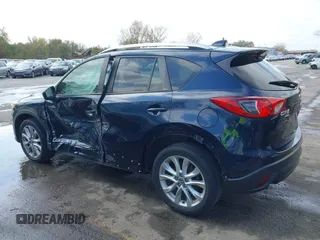 2015 Mazda CX-5 Grand Touring with VIN JM3KE4DY7F0478823, listed as a IAAI auction lot 40731626 with 82,884 mi miles. Bid and sale history available at carsss.com. Image 14.