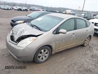 2004 Toyota Prius z VIN JTDKB20U940001168, wystawiony jako IAAI lot #41065063 z przebiegiem 299 999 mil mil oraz . Historia ofert i sprzedaży dostępna na DreamBid. Obrazek 2.
