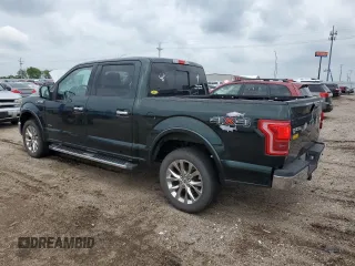2015 Ford F-150 XLT with VIN 1FTEW1EG0FKD21372, listed as a Copart auction lot 61355525 with 172,421 mi miles and Salvage title. Bid and sale history available at DreamBid. Image 2.