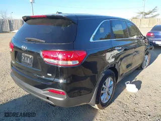 2016 Kia Sorento LX with VIN 5XYPG4A35GG115773, listed as a IAAI auction lot 41467622 with 112,311 mi miles. Bid and sale history available at carsss.com. Image 4.