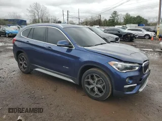 2017 BMW X1 xDrive28i with VIN WBXHT3C3XH5F69573, listed as a Copart auction lot 52719715 with 93,981 mi miles and Salvage Title. Bid and sale history available at DreamBid. Image 4.
