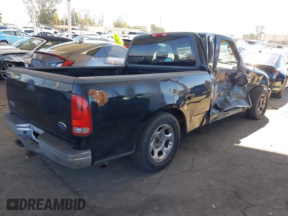 2002 Ford F-150 XL with VIN 1FTRX17WX2NB99454, listed as a IAAI auction lot 41643850 with 180,149 mi miles. Bid and sale history available at carsss.com. Image 4.