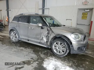 2017 MINI Countryman Cooper S with VIN WMZYT5C37H3B66882, listed as a Copart auction lot 45232525 with 87,094 mi miles and Salvage title. Bid and sale history available at DreamBid. Image 4.