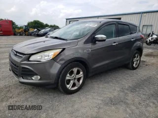 2013 Ford Escape SE z VIN 1FMCU0GX3DUC84495, wystawiony jako Copart lot #64011405 z przebiegiem 163 783 mil mil oraz Szkoda całkowita • Salvage title. Historia ofert i sprzedaży dostępna na DreamBid. Obrazek 1.