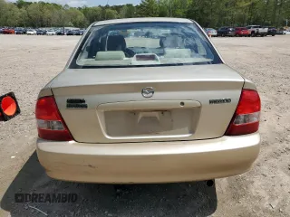 2001 Mazda Protege LX with VIN JM1BJ225810473897, listed as a Copart auction lot 52192045 with 145,839 mi miles and Salvage Title. Bid and sale history available at carsss.com. Image 6.