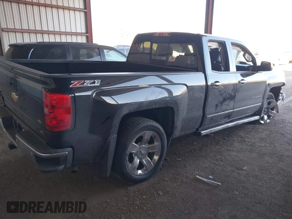 2014 Chevrolet Silverado 1500 LTZ with VIN 1GCVKSEC9EZ165028, listed as a IAAI auction lot 41444111 with 121,929 mi miles and . Bid and sale history available at DreamBid. Image 4.