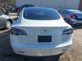 2020 Tesla Model 3 Long Range with VIN 5YJ3E1EBXLF636963, listed as a IAAI auction lot 41826249 with 68,085 mi miles. Bid and sale history available at carsss.com. Image 17.