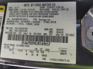 2018 Ford Fusion Titanium with VIN 3FA6P0D9XJR169657, listed as a IAAI auction lot 42392112 with 62,754 mi miles and . Bid and sale history available at DreamBid. Image 9.